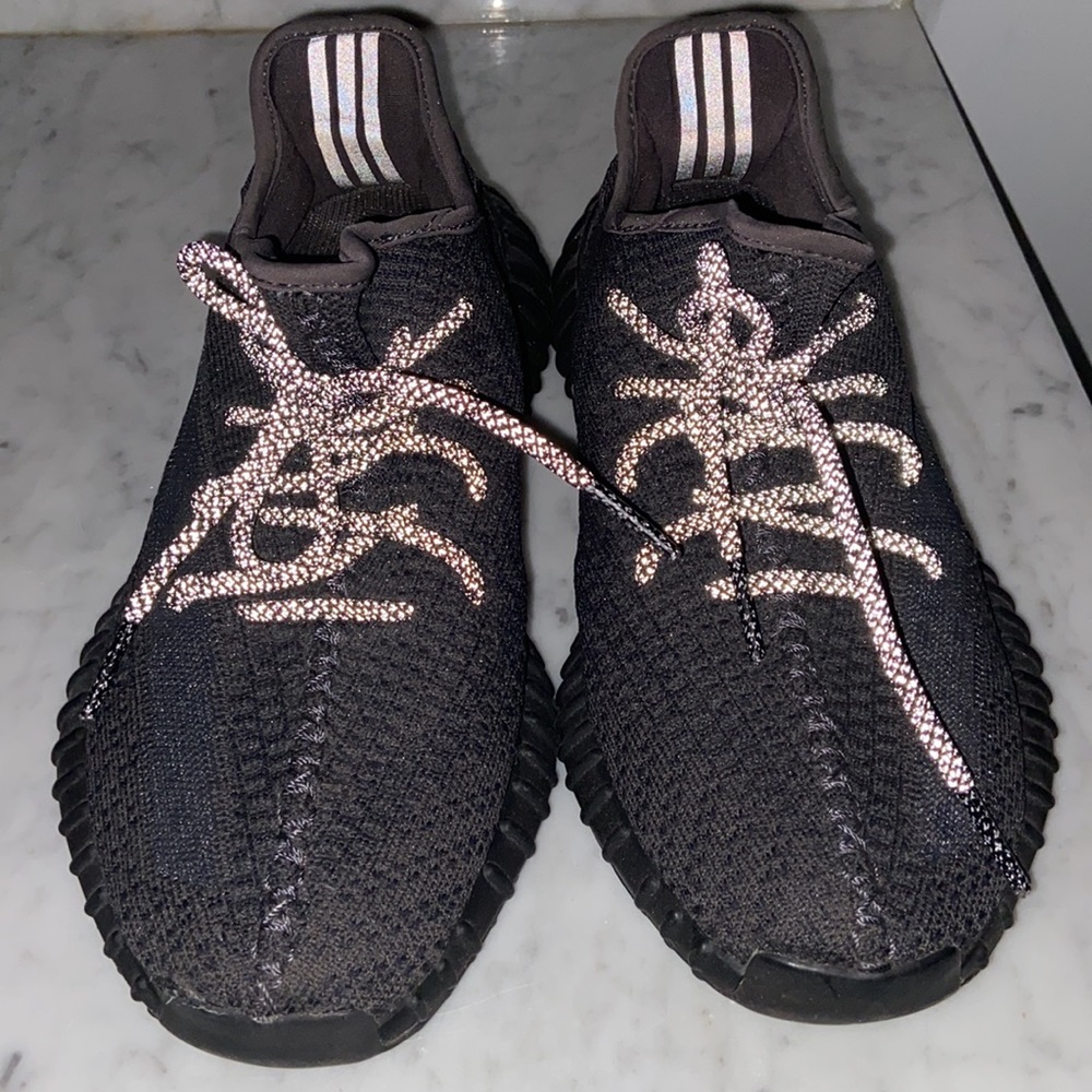 Black Reflective Yeezy’s Size 9. Worn a handful of times. No longer have box.